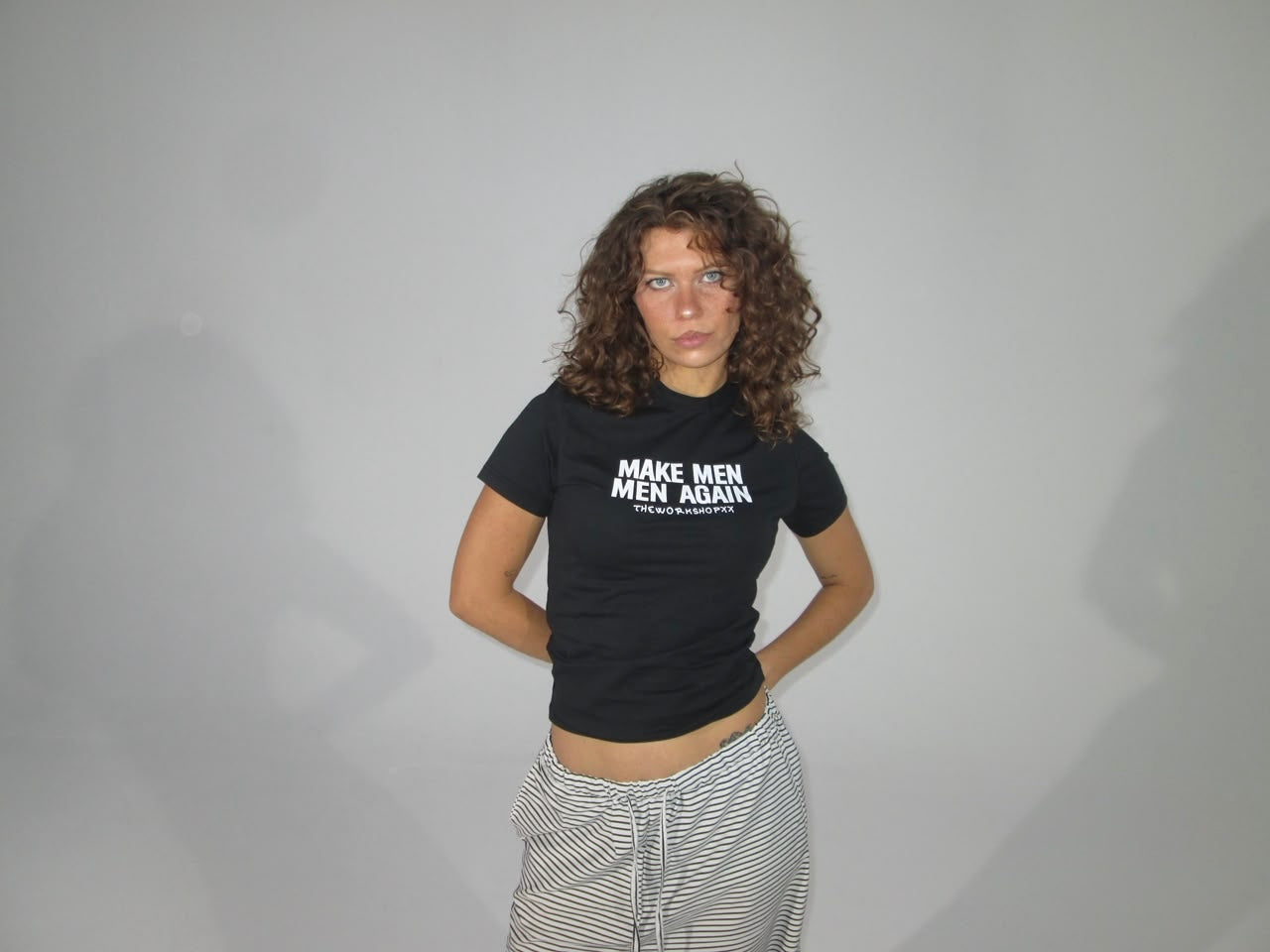 Make men men again in black baby tee