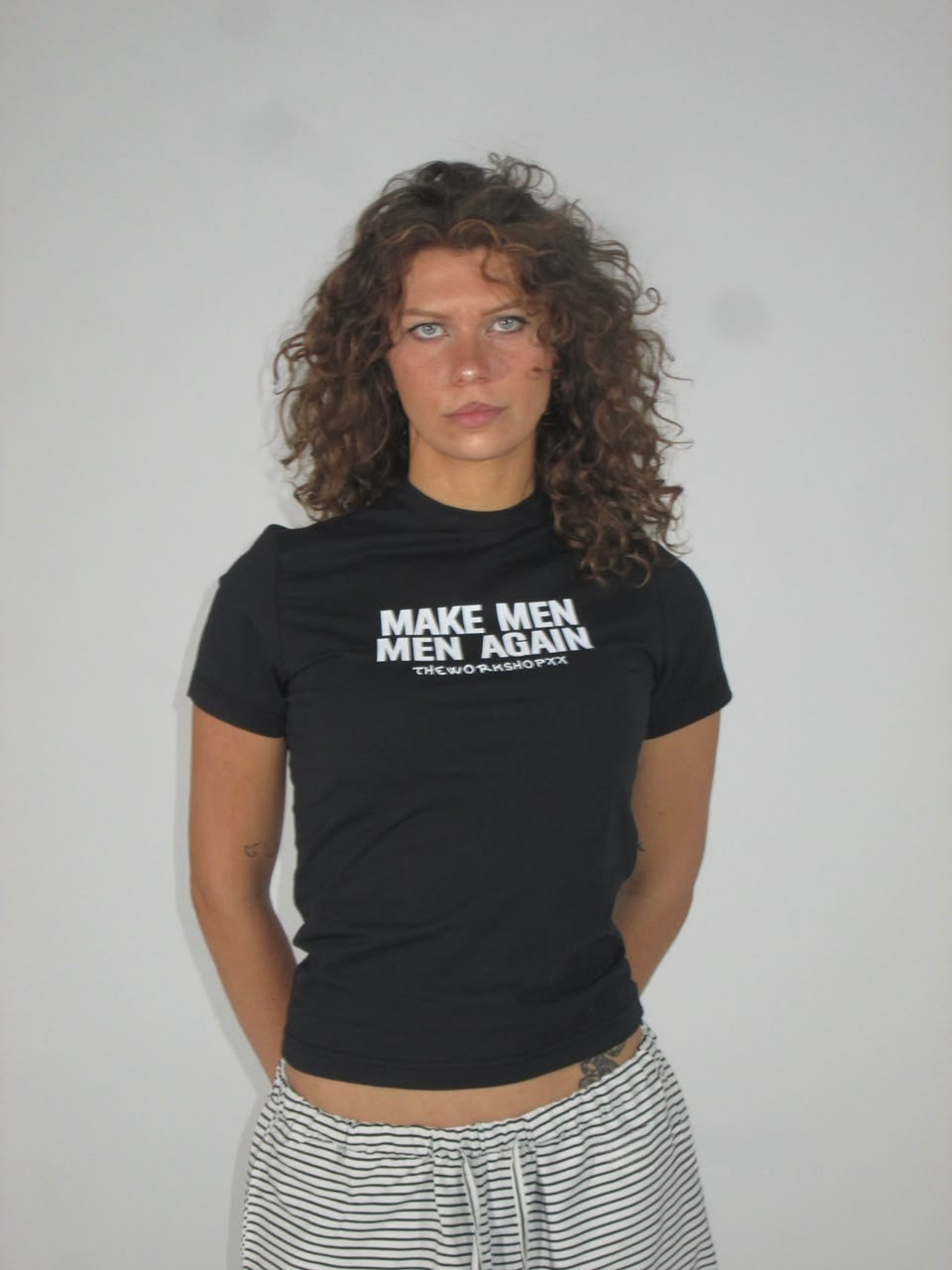 Make men men again in black baby tee