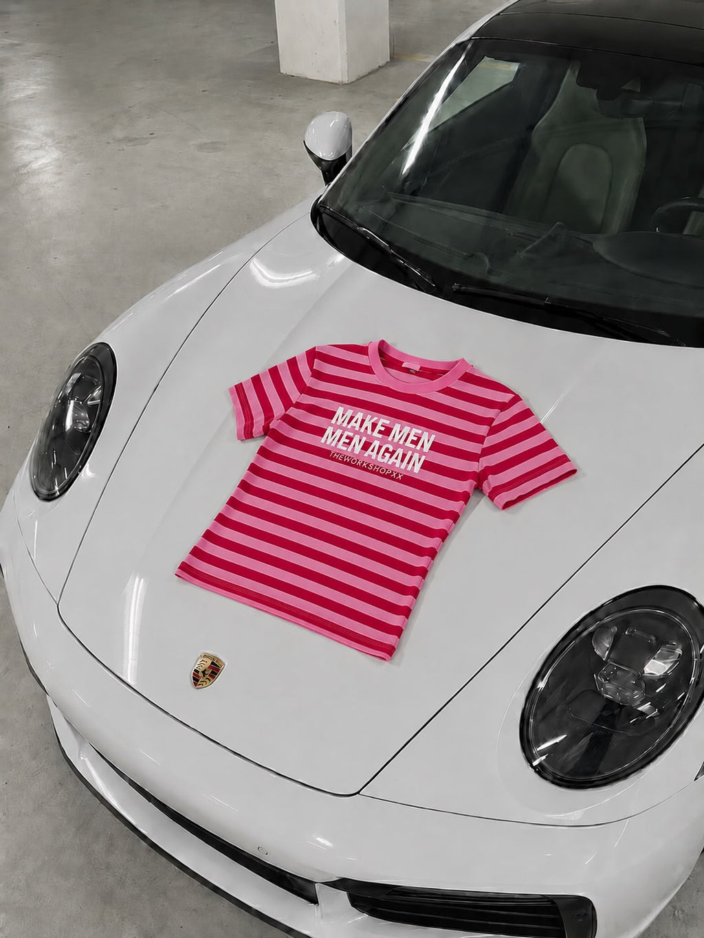 Make men men again in red-pink striped baby tee