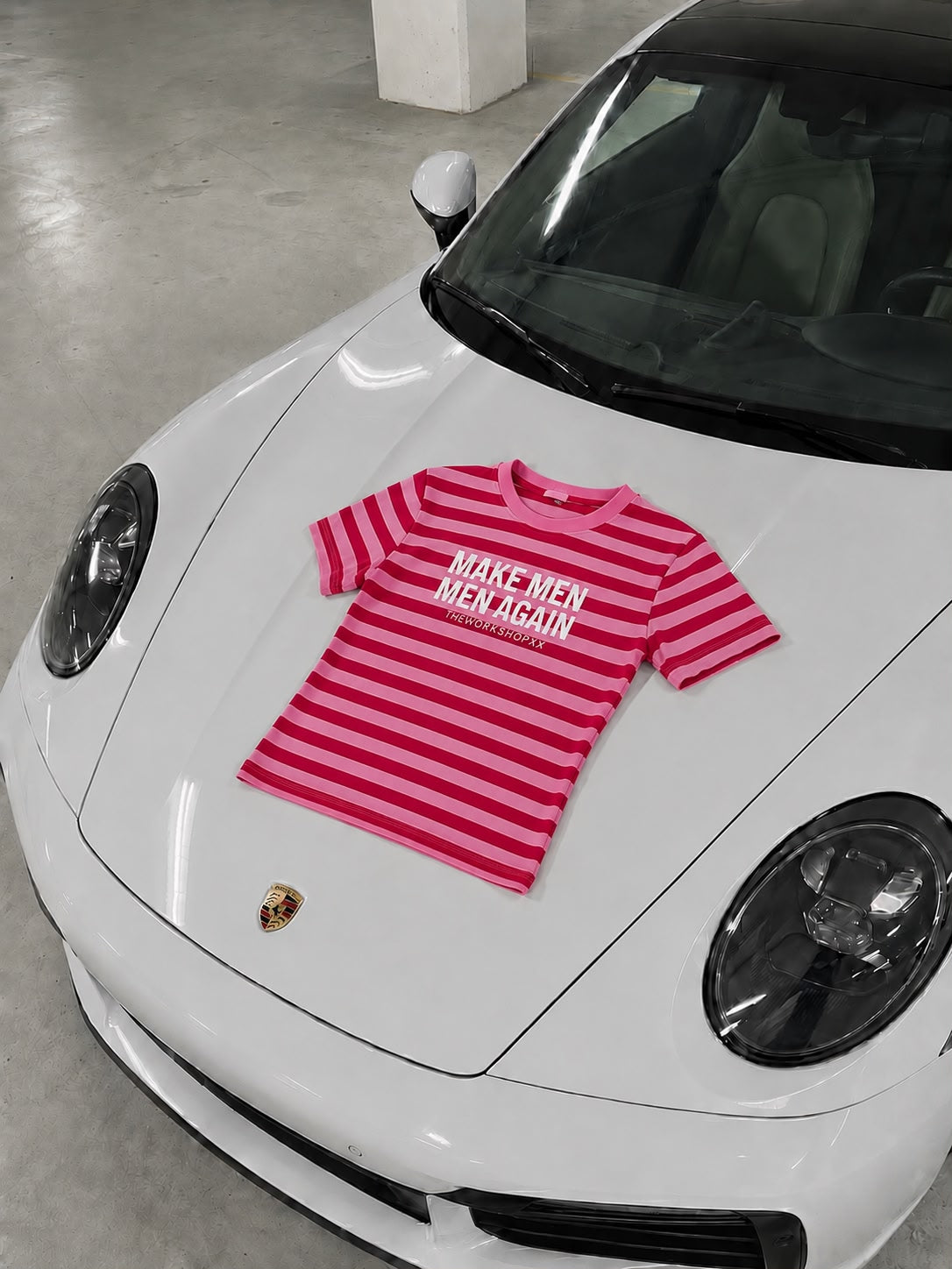 Make men men again in red-pink striped baby tee